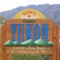A wooden sign alongside a mountain road and river reads "Welcome to Canada's Yukon--Canada's True North"
